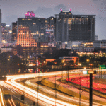 Infrastructure and real estate value graphic showing highways and transit connections driving property performance.