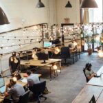 Coworking real estate trend image showing flexible office spaces and hybrid work environments.