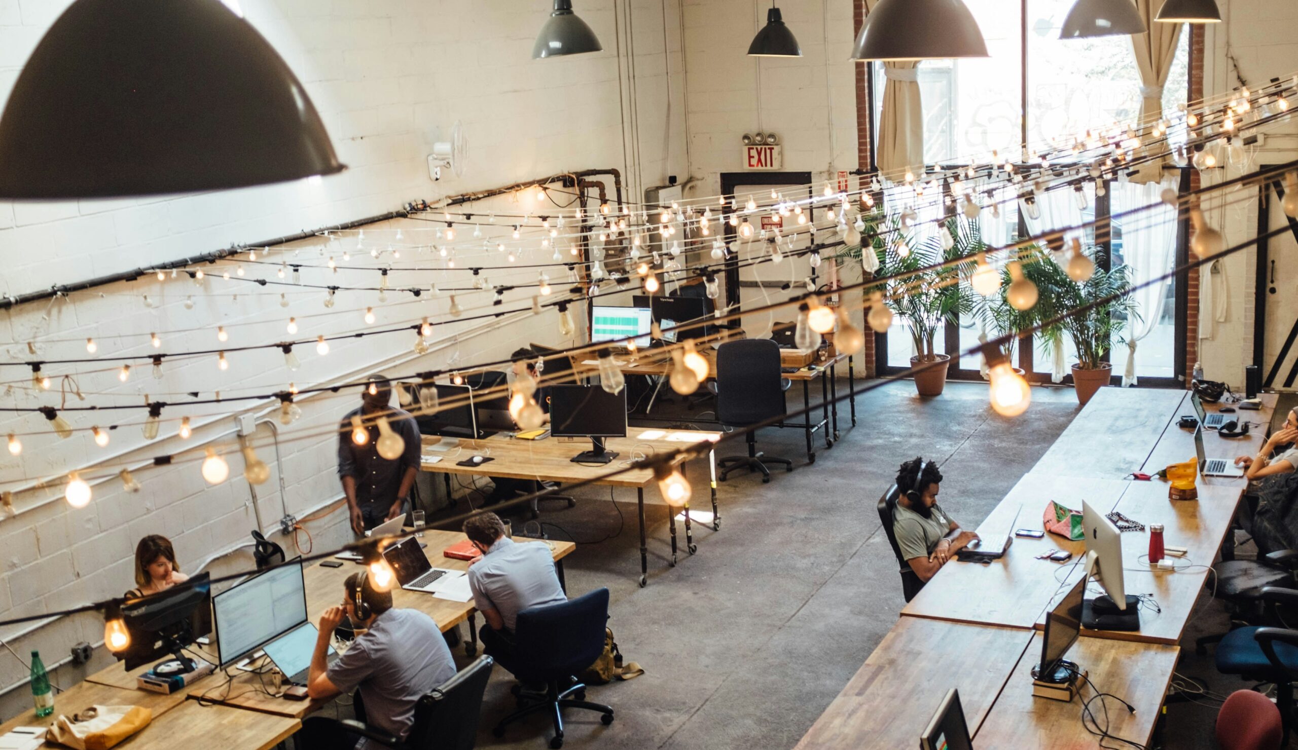 Coworking real estate trend image showing flexible office spaces and hybrid work environments.